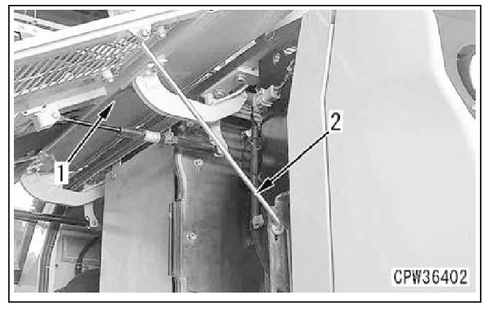  Hình 27: Mở khóa thanh khóa (2) và đóng nắp chụp (1) ở bên trái của máy